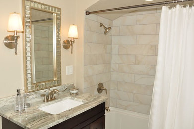 Example of a mid-sized trendy 3/4 bathroom design in Other with shaker cabinets, dark wood cabinets, beige walls, an undermount sink and quartzite countertops