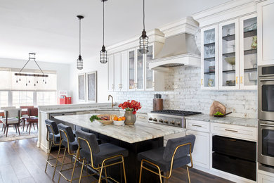 Eat-in kitchen - large eclectic l-shaped dark wood floor and brown floor eat-in kitchen idea in Philadelphia with an undermount sink, shaker cabinets, white cabinets, granite countertops, white backsplash, ceramic backsplash, stainless steel appliances, an island and beige countertops