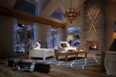 Large arts and crafts formal and open concept medium tone wood floor and brown floor living room photo in New York with beige walls, a standard fireplace, a stone fireplace and no tv