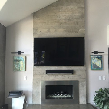 Concrete board form veneer tile fireplaces surround and concrete hearth