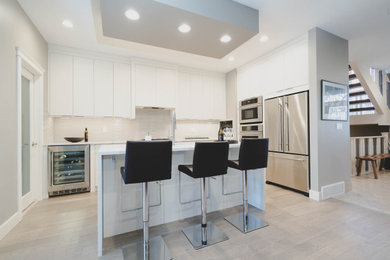 Example of a trendy kitchen design in Calgary