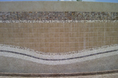 Inspiration for a large contemporary stone exterior home remodel in Austin