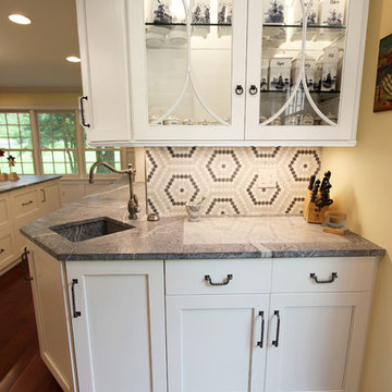 White Cabinets, Grey Countertops and Edgy Tile Backsplash