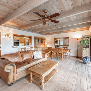 Before - Original Living, Dining and Kitchen in Knotty Pine