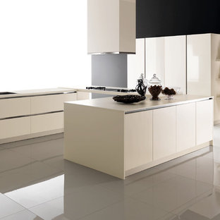 Photo of a mid-sized modern single-wall kitchen pantry in San Diego with a double-bowl sink, open cabinets, white cabinets, stainless steel benchtops, white splashback, ceramic splashback, panelled appliances, ceramic floors and with island.