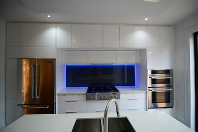 Example of a mid-sized minimalist kitchen design in Toronto
