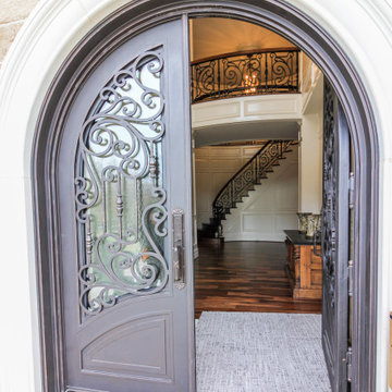 Project #74 | Circular Staircase with Hand-Forged Metal Panels
