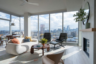 Example of a mid-sized trendy living room design in Portland with a tile fireplace