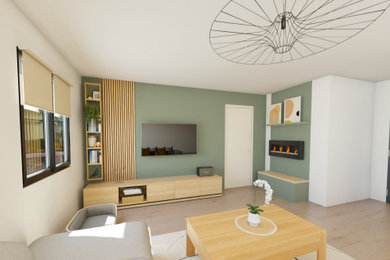 Aménagement d'un salon en bois de taille moyenne avec un mur vert, cheminée suspendue et un téléviseur fixé au mur.