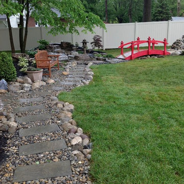Gren Brook, NJ. Backyard Stone Path, Bridge and Zen Sand Court for Man Caves TV