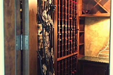 Inspiration for a timeless wine cellar remodel in Austin