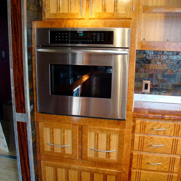Figured cherry kitchen cabinets