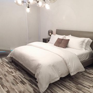 Striped Patchwork Cowhide Rug in beautiful modern, relaxed bedroom