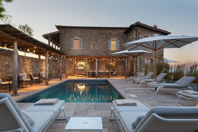 Inspiration for a mediterranean tile and rectangular pool remodel in Florence