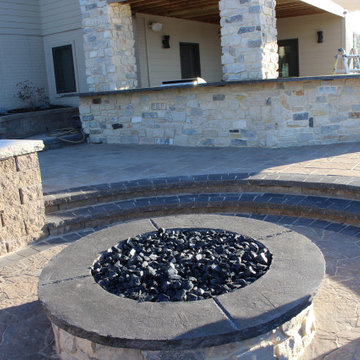 Cozy Stone Fire Pit with built in Social Circle