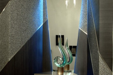 Example of a minimalist granite floor double front door design in Miami with a metal front door