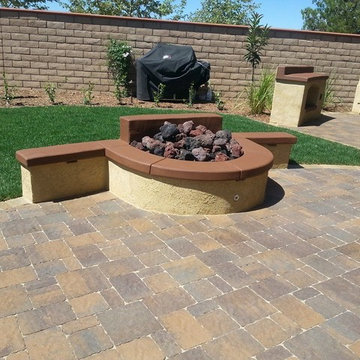 Fire Pit with Sitting Wall and Interlocking Pavers