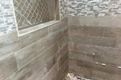 Bathroom - modern master glass sheet ceramic tile and gray floor bathroom idea in Indianapolis