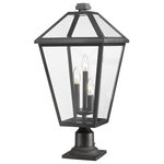 Z-Lite - Talbot 3 Light Outdoor Pier Mounted Fixture in Black - Illuminate an exterior front or back walkway with a classic fixture reflecting a charming village theme. Made from Midnight Black metal and clear beveled glass panels this three-light outdoor pier mounted fixture delivers a charming upgrade with industrial-inspired attitude and a cage silhouette that's perfect for lower-level gardens and walkways.andnbsp