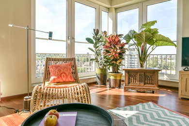 Inspiration for a tropical living room remodel in Amsterdam