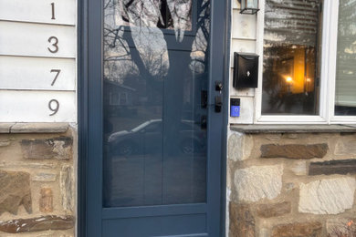 Inspiration for a contemporary entryway remodel in Philadelphia with a blue front door