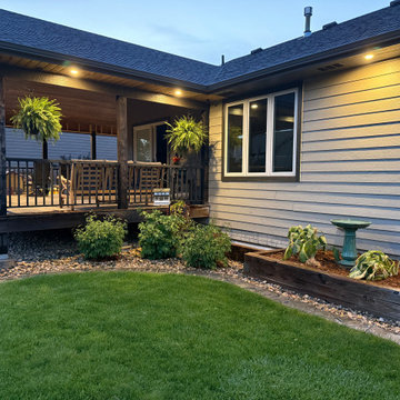 Custom Cedar Covered Deck with Built-In Stone Fireplace and Patio — Sioux Falls