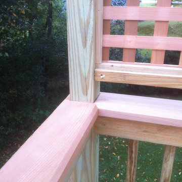 Presure treated deck with cedar cap rail and, privacy lattice