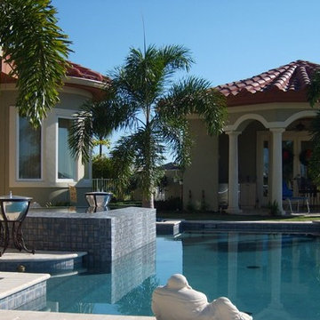 Apollo Beach Contemporary Pool & Spa w/ Traditional Pavilion & Landscape