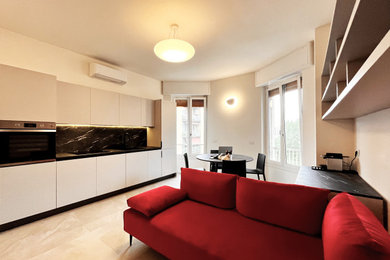 Esempio di una cucina minimal di medie dimensioni con pavimento in gres porcellanato e pavimento grigio