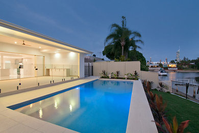 This is an example of a mid-sized modern pool in Gold Coast - Tweed.