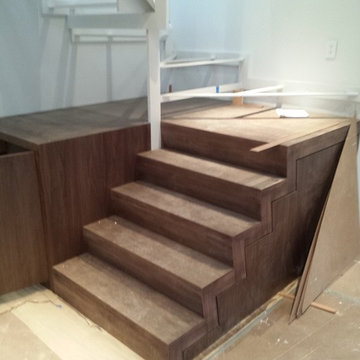 Custom walnut stairs & wet bar Soho- New York, NY