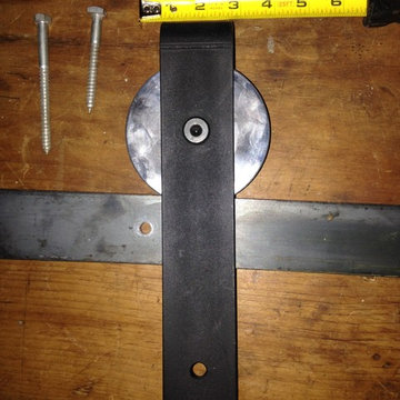 Our own line of our hand made sliding door hardware