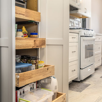 White Kitchen Pantry with Pull Out Shelves