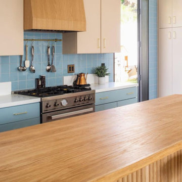 Stainless Steel Range in a Pastel Kitchen