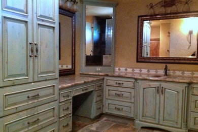 Bathroom - large country master brown tile and ceramic tile ceramic tile bathroom idea in Other with raised-panel cabinets, granite countertops, brown walls and blue cabinets
