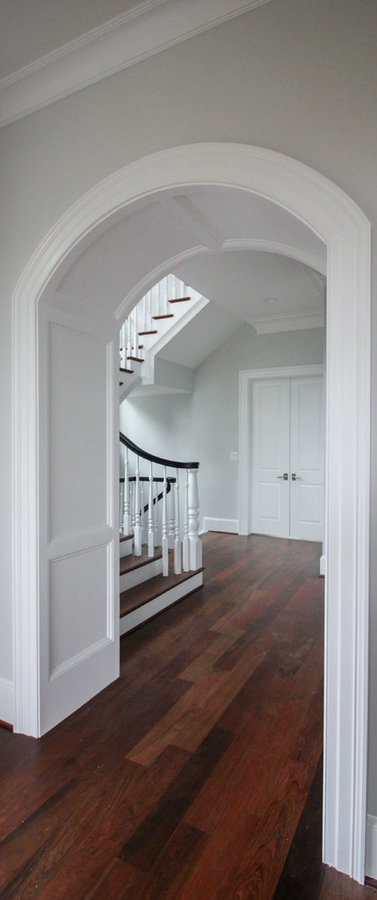 Powerful Impression by Floating Staircase in Suburban Foyer