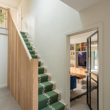 Loughton House Concrete Stairs with Green and Beige Stair Runner