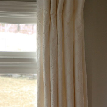 Soft white master bedroom
