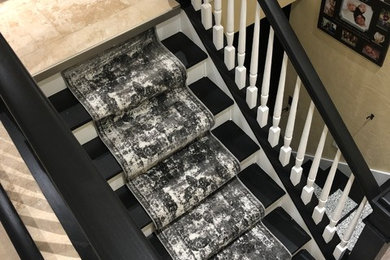Staircase - contemporary staircase idea in Other