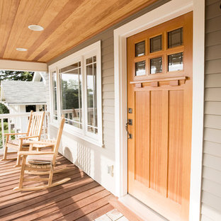 Photo of an arts and crafts front door in Seattle with a single front door.