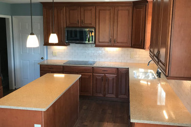 Example of an arts and crafts kitchen design in Charlotte