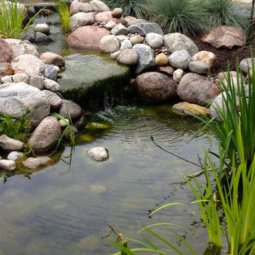 Relaxing Retreat with a Natural Pond Water Feature