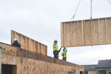 Surélévation et extension d'une maison individuelle en structure bois.