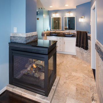 Exquisite Master Bath with 3 Sided Fireplace & Frosted Glass Compartment