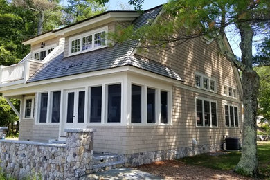 Example of an arts and crafts home design design in Portland Maine
