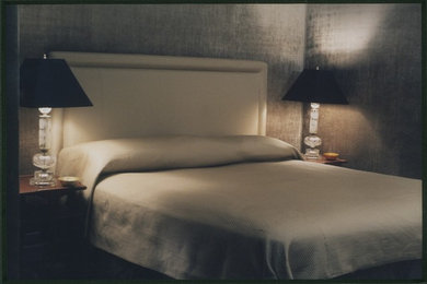 Example of a transitional bedroom design in New York