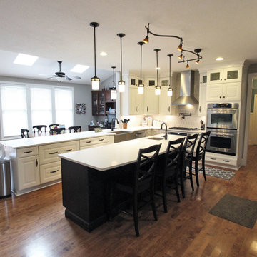 White Kitchen with Espresso Island and Eternia Caringdale Quartz Countertop