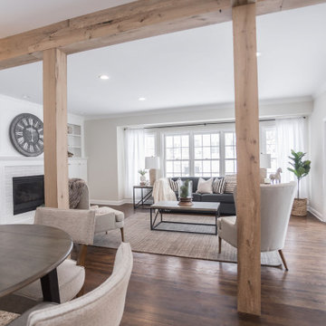 Antique White Oak Box Beam Posts and Header Framing a Living Room Entry