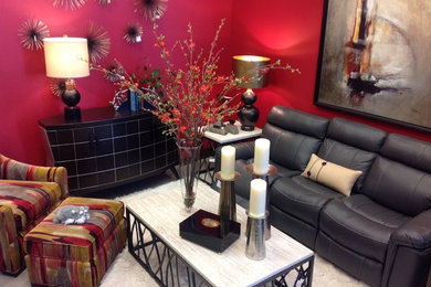 Example of a small transitional enclosed carpeted family room design in Other with red walls, no fireplace and no tv