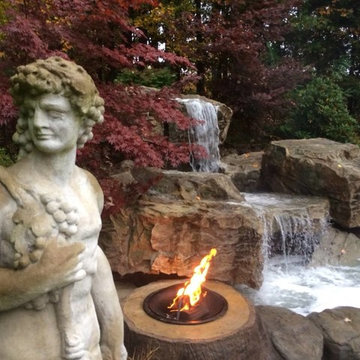 New Waterfall and Fire Pit installation over existing waterfall